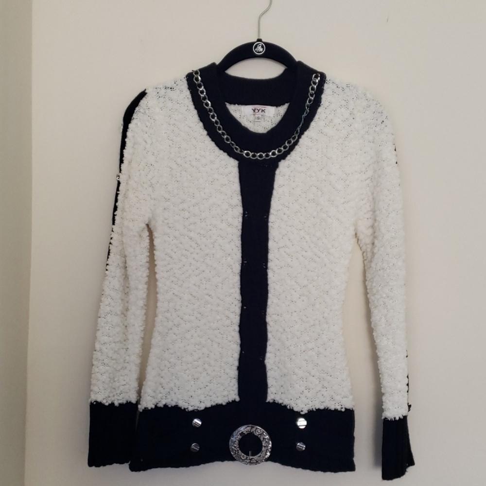 Sweater. Dry clean only.